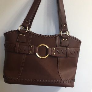 Really cute purse kinda looks country but stylish